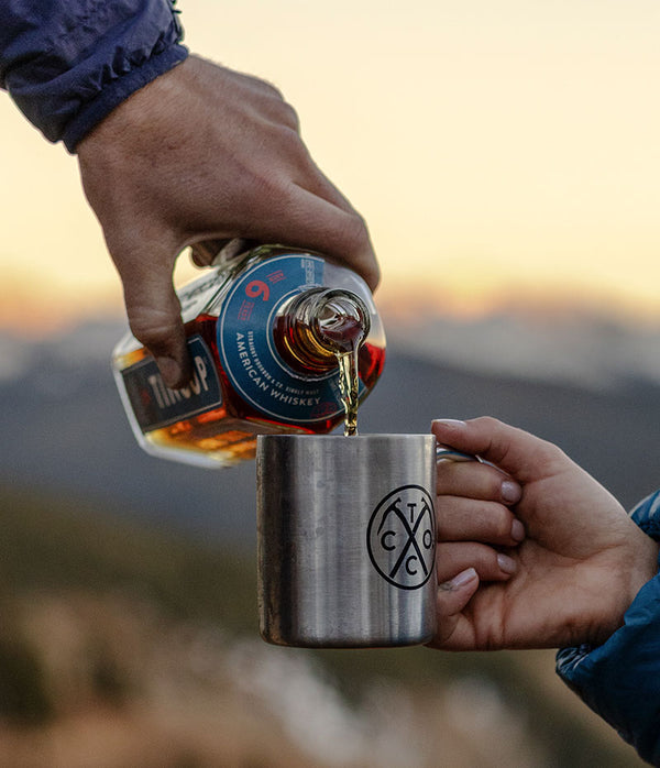 TINCUP 6 Year American Whiskey Being Poured into Carabiner Mug